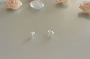 Обеци от сребро с бели естествени речни перли